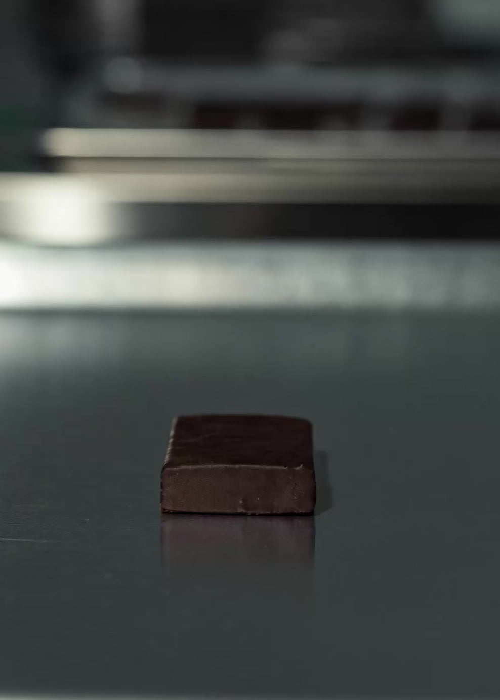 Midnight Deluxe protein bars with dark chocolate drizzle — high protein, low sugar.